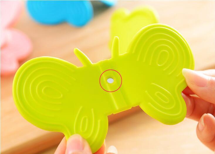 Grytlapp i silikon – Fjäril