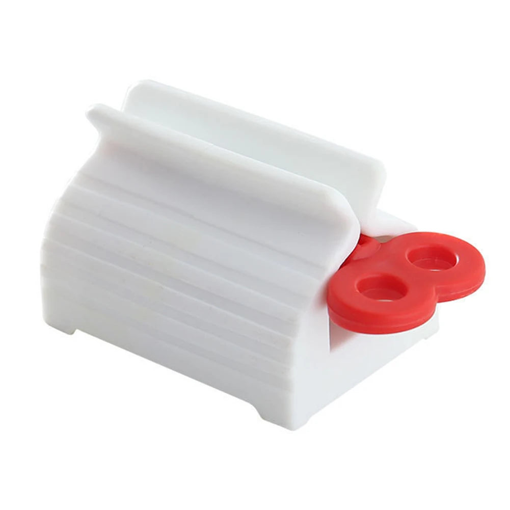 Tandkräm Squeezers, tandkrämsdispenser - Röd
